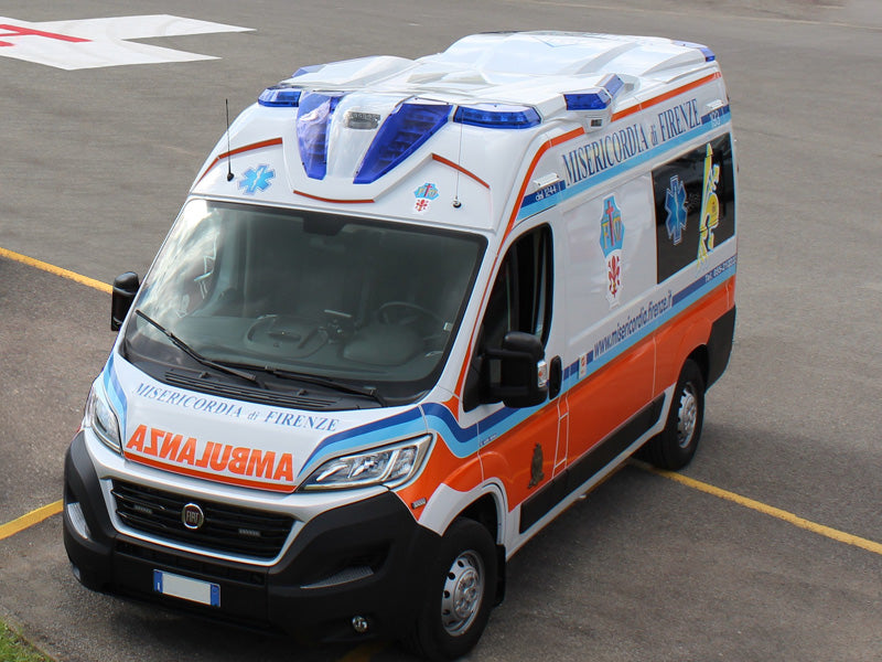 ambulance with roof integrated blue warning lights