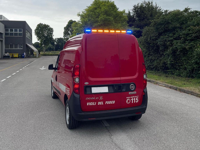 Amber and blue arrowbar and beacon on fire van