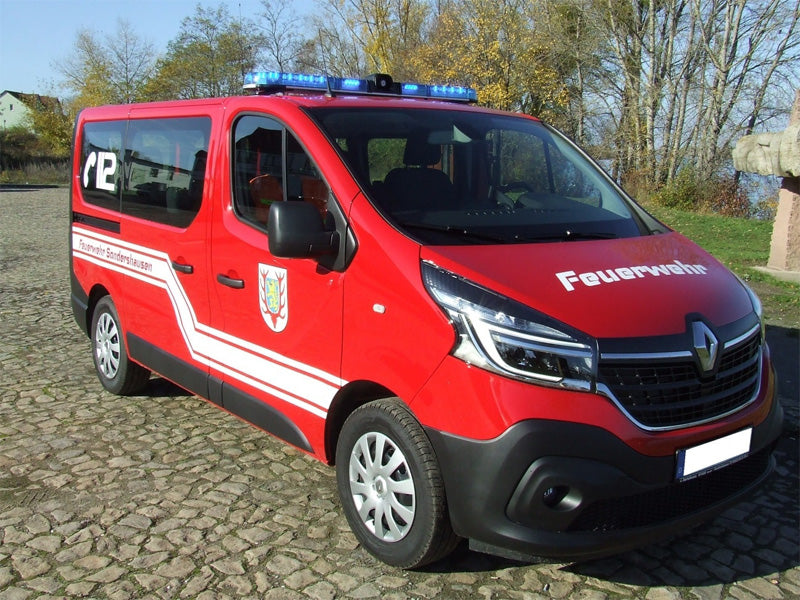 Fire van with blue lightbar and speaker