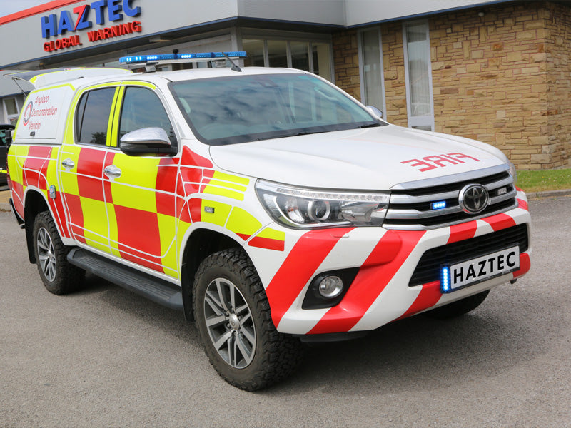 Fire pickup with blue lightbar and LED lights