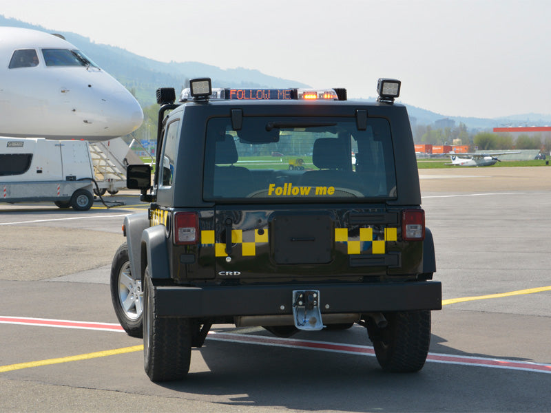 Lightbar message sign on airport vehicle
