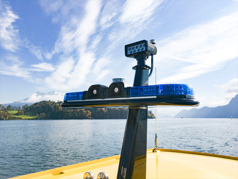 Boat with lightbar and fitted speakers